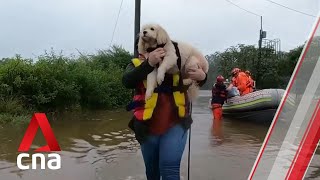 Australia's military mobilised to rescue thousands trapped by flood crisis