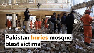 Pakistan buries mosque blast victims