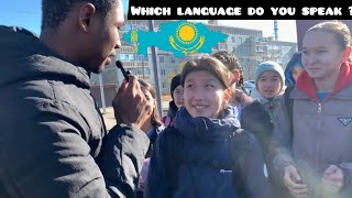 Which language do people in Kazakhstan speak?