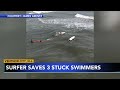 Surfer helps rescue 3 swimmers at the Jersey shore