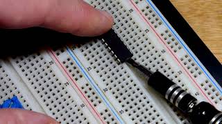 How to safely remove an integrated circuit IC from a breadboard using a small screwdriver