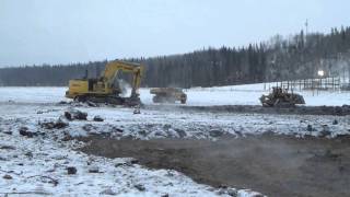 Komatsu 1250 with 10 yard bucket | Loading Blocks of Muskeg