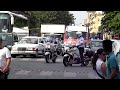 bmw r 1200rt and yamaha 1300 fjr police motorcycles escort ambulance through paris traffic.