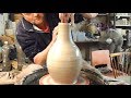 Making / Throwing a Tall Necked Pottery Vase on the Wheel