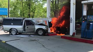 Driver injured in fiery gas station crash