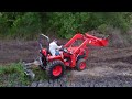 digging out pond with kubota l3400 tractor