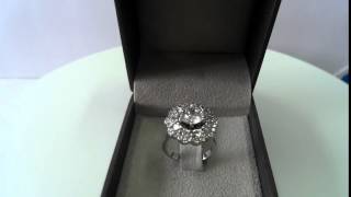 4.00 CT E VS2 ROUND DIAMOND WITH ADJACENT STONES 14 K WG