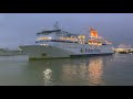 Normandie, Brittany Ferries ship docking in reverse at nighttime in Portsmouth