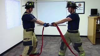 Skill Drill 15-5: Performing the 2 FF Stiff-Arm method of uncoupling a fire hose
