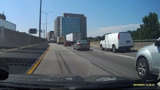 Dashcam View of Autoroute 40 Highway Westbound in Montreal, Quebec, Canada