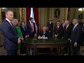 president trump signs documents following inauguration