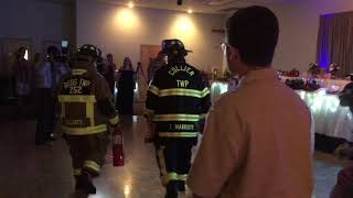 8/25/18 firefighter garter removal. Firefighter wedding.