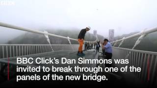 China's giant glass bridge hit with sledgehammer   BBC News