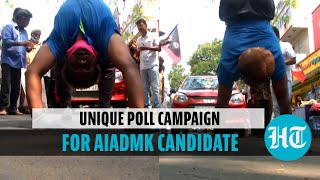 Yoga instructor pulls car walking upside down; campaigns for AIADMK candidate