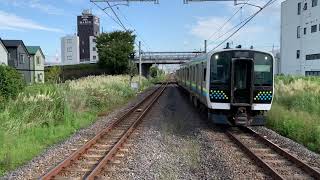 JR浜野駅を通過するE131系3133M回送列車(千マリR11編成)。