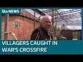 The Ukrainian villagers caught in war's crossfire | ITV News