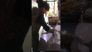 Famous Chinese street food - Amazing skills of Chinese lady cutting dough to make youtiao 油条 #Shorts