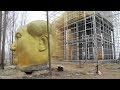 Giant golden statue of China's Mao dismantled