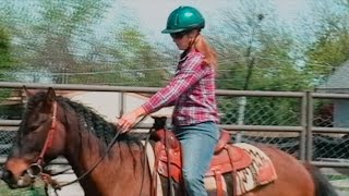 Cantering with a wild Mustang