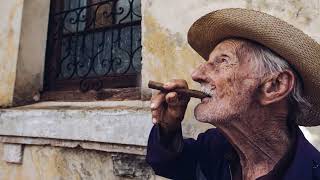 old man, unlit cigar