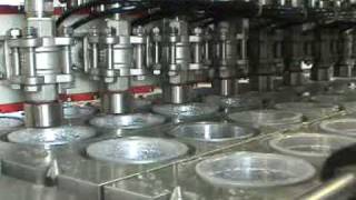 Mineral water filling and sealing machine