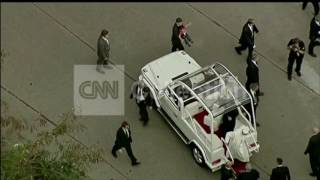 POPE WAVES TO CROWDS IN RIO