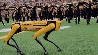 Boston Dynamics Robot Dances With Cheerleaders During a Football Game