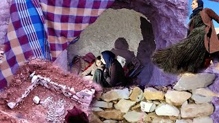 The stone architecture of a nomadic mother at the entrance to her cave