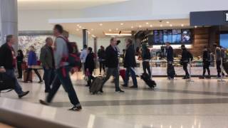 Ambient video relaxing at SFO Terminal 3. Background video. People watching.