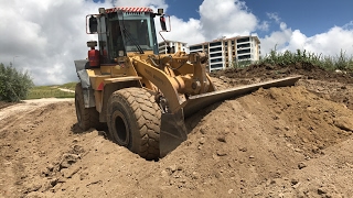 Cat 950 f caterpillar dağ gibi toprakla boğuşması çalışmaları