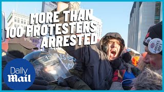 Freedom Convoy: Police arrest over 70 protestors in Ottawa at truckers protest