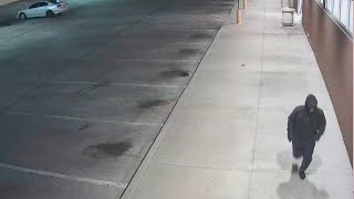 Surveillance video shows a robbery suspect running from the CVS store after shooting