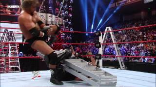 Triple H uses a ladder to help him apply the Figure Four on Kevin Nash: WWE TLC 2011