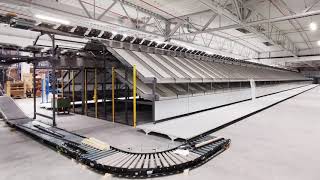 Tilt&tray sorter Denisort by Ferag AG timelapse video