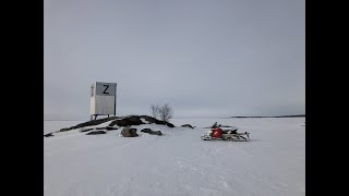 Ice fishing trip In lake Inari Finland