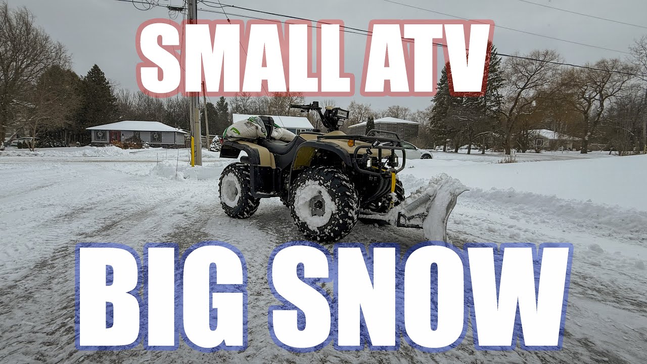 Small Atv Plowing Deep Snow Youtube