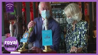 Prince Charles Pulls a Pint of Beer at the Prince of Wales Pub