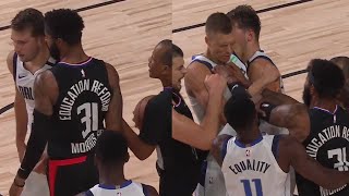 Kristaps Porzingis defends Luka Doncic by shoving Marcus Morris then gets ejected