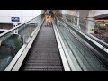 Bristol, England. 1x O&K KONE Travelator (up) at Clifton Down Shopping Centre outside Sainsbury’s