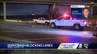 Crews clear semi, continue cleanup after blocking westbound I-40 near I-35