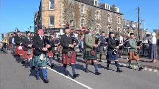 March of the Stewards led by massed pipers to the 2021 Argyllshire Gathering Oban Highland Games