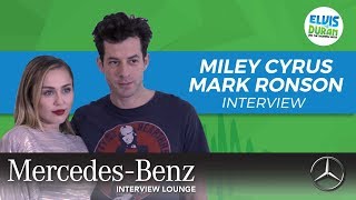Miley Cyrus and Mark Ronson on 