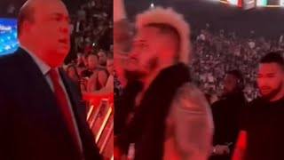 Off air footage of a pissed off Paul Heyman looking Solo sikoa new bloodline member at WWE Backlash