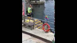 Man in HongKong Throws Trash into Ocean