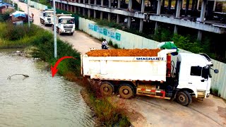 Amazing!! starting project filling land into flood land huge Dump truck 25ton with Bulldozer Komats…