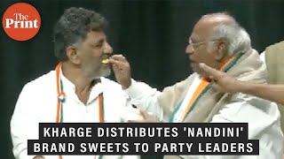 Kharge distributes 'Nandini' brand sweets to party leaders as Congress celebrates Karnataka win