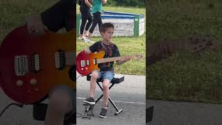 3rd grade talent show - Playing Seven Nation Army by White Stripes on the guitar