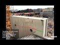 demolition of a stair tower using a diamond saw and a crane