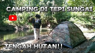 Camping di tepi sungai dalam hutan bersantai menikmati suasana alam bersantai bersama teman.