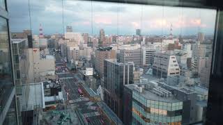 新潟市古町・NEXT21ビルのシースルーエレベーター - Niigata Furumachi Sunset View fron See-through Elevater